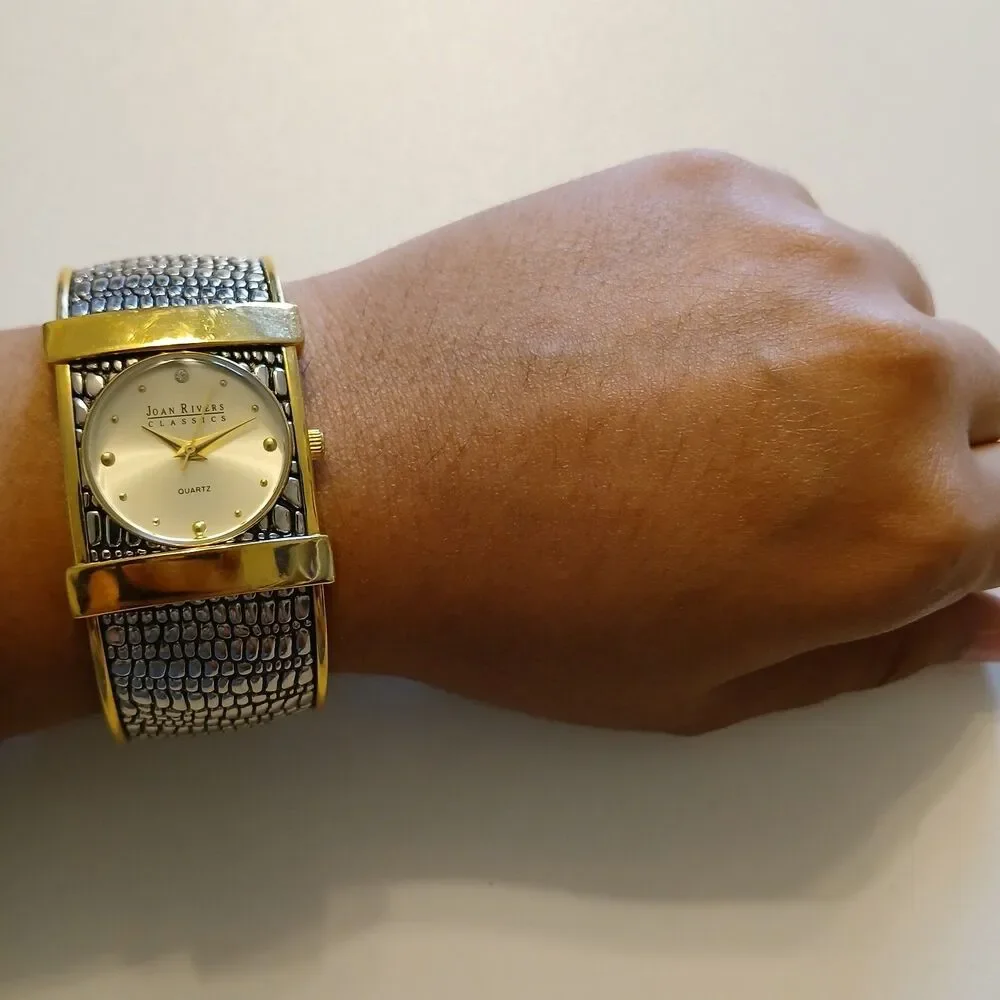 Joan Rivers watch running
